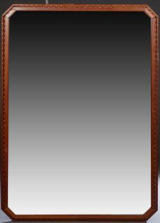 American Carved Mahogany Octagonal Overmantel Mirror, late 19th c., the wide beveled plate inside a plain board liner and an outer floral carved borde