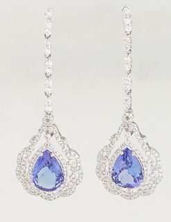 Pair of Platinum Pendant Earrings, with a diamond mounted stud to a diamond link chain and a pierced pendant with a pear shaped tanzanite with a diamo