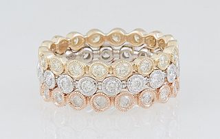 Set of Three Tricolor Diamond Mounted Bands, one of yellow gold, one of white gold and one rose gold, each with 15 bezel set round diamonds, total dia