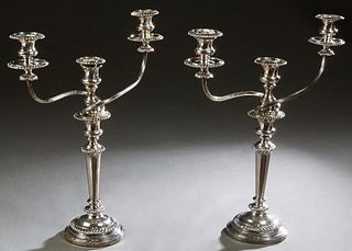 Pair of Georgian Style Silverplated Three Light Candelabra, 20th c., with a central arm and candle cup over two scrolled arms with like candle cups an