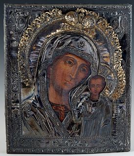 Russian Icon of the Virgin of Kazan, St. Petersburg, 19th c., possibly by Mikhail Sokolov, oil on curved wooden panel, with a sterling and enamel okla