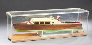 Vintage Carved Mahogany Chris Craft Cabin Cruiser Model, the "Lois Ann, St. Louis, MO," presented in a lucite case, Case- H.- 12 1/8 in., W.- 38 1/2 i