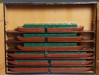 Group of Six Wooden Model Tow Barges, 20th c., each painted "Inland Waterways Corp.," three of smaller size, H.- 3 in., W.- 28 3/4 in., D.- 6 in.; and