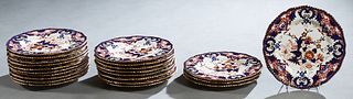 Set of Twenty-Two Mason's Ironstone Imari Plates, early 19th c., the scalloped gilt decorated plates in the typical Imari palette of red, orange, coba