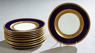 Set of Twelve Bavarian Porcelain Plates, late 19th c., with gilt Greek key rims around wide cobalt bands and an inner band of leaf scrolls and Greek k