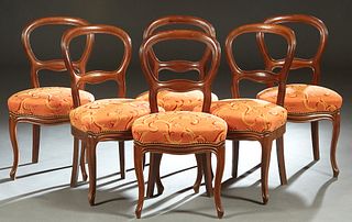 Set of Six French Carved Walnut Louis Philippe Dining Chairs, 19th c., the arched curved medallion back over a bowed upholstered seat, on cabriole leg