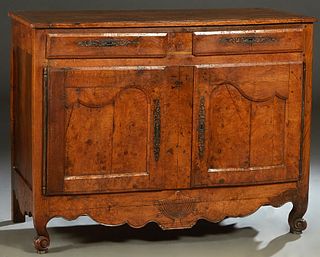 French Provincial Louis XV Style Carved Walnut Sideboard, 19th c., the stepped rounded edge and corner top over two frieze drawers with iron escutcheo