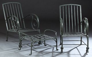Three Piece Wrought Strap Iron Patio Set, 20th c., consisting of a pair of armchairs and a stool, the chairs with arched canted slat backs over well s