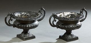 Pair of Cast Iron Handled Jardinieres, 20th/21st c., the everted rim over a baluster side, on an integral square base, H.- 15 in., W.- 24 in., D.- 16 