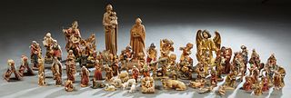 Large Group of Approx. 63 Carved Wood Nativity Figures, 20th c., by Lepi, Pema, Ladina, and Barthels, consisting of Joseph, Hummel like figures of chi