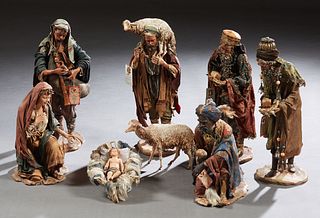 Angela Tripi (Italian), Eight Terracotta and Cloth Nativity Figures, 20th c., consisting of the baby Jesus in a crib; the three kings; the Virgin Mary
