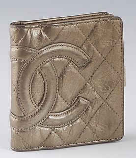 Chanel Cambon Ligne Small Wallet, in gold quilted calf leather and ruthenium hardware, the snap closure opening to eight card slots, a bill holder lin
