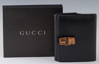 Vintage Gucci Bamboo Wallet, in crocodile imitation black calf leather with bamboo black metal hardware, the interior opening to an bill pocket, ID po