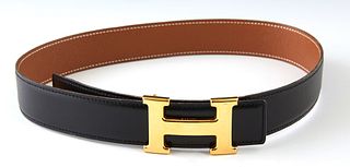 Hermes H Belt, c. 1996, in tan and black Barenia box calf leather with gold hardware, L.- 25 1/2 in., W.- 1 1/4 in.