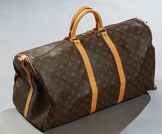 Louis Vuitton Keepall Bandouliere 55 Travel Bag, in brown monogram coated canvas with Vachetta handles and golden brass hardware, opening to a brown c