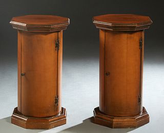 Pair of French Carved Beech Louis Philippe Nightstands, 19th c., of columnar form, the stepped octagonal top over a cylindrical cupboard door with a c