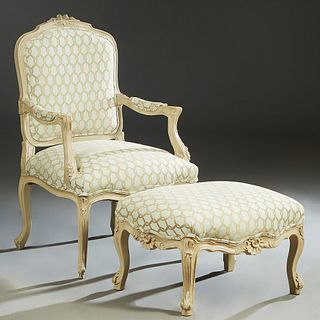 Louis XV Style Carved and Polychromed Beech Fauteuil, 20th c., the arched canted floral carved upholstered back over upholstered arms and a bowed upho