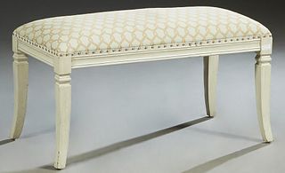 Polychromed Beech Double Bench, 20th c., the upholstered top over a wide skirt, on square splayed saber legs, in pale green and tan chain link silk fa