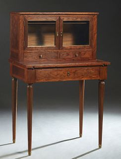 French Banded Louis XVI Style Mahogany Writing Table, c. 1900, the back with double glazed doors above small frieze drawers, on a base with a fold out