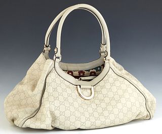Gucci D-Ring Hobo Shoulder Bag, in ivory Guccissima calf leather with gold hardware, opening to a cream, red and green canvas bit motif lined interior