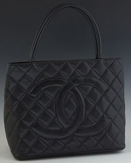Chanel Medallion 26 Shoulder Bag, in black quilted calf leather with hammered silver hardware, opening to a black leather lined interior with a side z