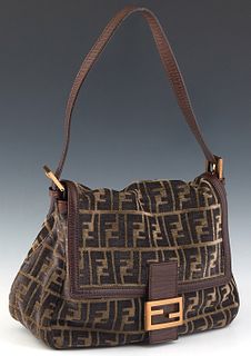 Fendi Front Logo Flap Shoulder Bag, in large monogram carpet canvas with brown leather accents and gold hardware, the magnetic snap closure opening to