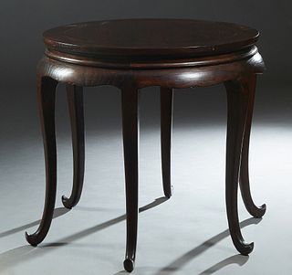 Chinese Carved Elm Circular Table, late 19th c., the stepped top over a curved skirt, on six cabriole legs, H.- 33 3/4 in., Dia.- 37 in.