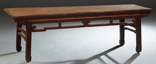 Chinese Red Lacquer Daybed, 19th c., with a woven rattan top over pierced skirts, on block legs, H.- 21 in., W.- 67 1/2 in., D.- 20 in.