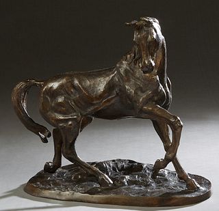 Continental School, "Trotting Horse," patinated bronze, on an integral relief decorated oval base, H.- 16 1/2 in., W.- 18 in., D.- 7 in.