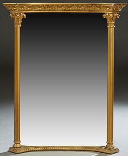 English Style Gilt and Gesso Overmantel Mirror, 20th c., with a stepped concave relief shelf top, on reeded columnar supports, flanking a rectangular 