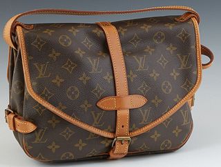Louis Vuitton Samur 25 Shoulder Bag, in brown monogram coated canvas with vachetta leather accents/straps and golden brass hardware, opening to a brow