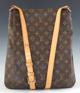 Louis Vuitton Musette Crossbody Bag, in brown monogram coated canvas with vachetta leather straps and golden brass hardware, the mono flap opening to 