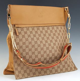 Gucci Large Messenger Bag, in monogrammed beige canvas and light brown leather with gold hardware, the magnetic snap closure opening to a dark brown n