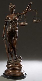 Lady Justice, 20th/21st c., patinated bronze, on an integral stepped circular base, on a thick figured black marble circular plinth, H.- 31 in., W.- 1