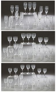 Seventy Piece Set of Etched Crystal Stemware, early 20th c., the sides with medallions and floral garland decoration, consisting of 18 red wines, 16 c