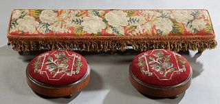 Antique Victorian Carved Mahogany Needlepoint Footstools, 19th c., consisting of a pair of circular examples with floral beadwork decoration; and a lo