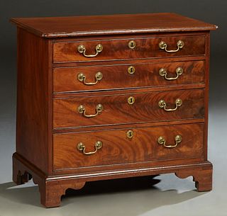 Diminutive English Georgian Carved Mahogany Chest, early 19th c., the stepped rounded edge and corner top over four graduated drawers, on a plinth bas