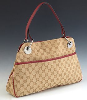 Gucci Eclipse Tote Bag, in beige monogrammed canvas with burgundy leather accents and ruthenium hardware, the magnetic snap closure opening to a burgu