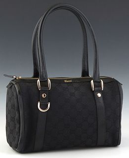 Gucci Abbey Boston Shoulderbag, in black monogram medium canvas with black leather accents and gold hardware, opening to a black canvas lined interior