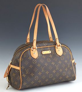 Louis Vuitton Montorgueil PM Shoulder Bag, in brown monogram coated canvas with vachetta leather accents and golden brass hardware, opening to a brown