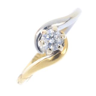 An 18ct gold diamond crossover ring. Of bi-colour design, the brilliant-cut diamond, to the asymmetr