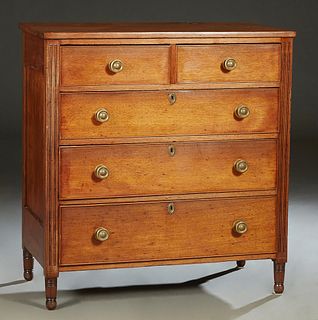 English Carved Mahogany Chest, early 20th c., the rectangular top over two frieze drawers and three deep drawers with brass pulls, flanked by incised 