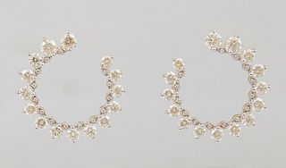 Pair of 18K Yellow Gold "Horseshoe" Earrings, each with 15 round diamonds joined by tiny round diamond mounted solid links, total diamond wt.- 4.05 ct