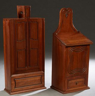 Two French Provincial Carved Walnut Candle Boxes, 20th c., one with an incise carved sliding lid; the second with a hinged slanting top over an incise