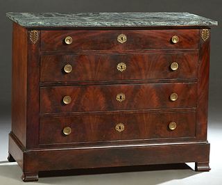 French Ormolu Mounted Empire Style Carved Mahogany Marble Top Commode, late 19th c., the verde antico marble over four drawers, flanked by ormolu moun