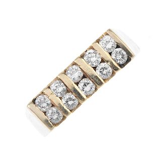 A diamond two-row ring. Designed as a two rows of brilliant-cut diamonds, with bar spacers, to the t