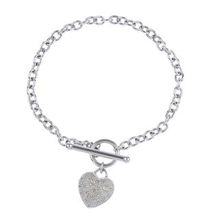 A 9ct gold diamond heart bracelet. The pave-set diamond heart, suspended from a belcher-link bracele
