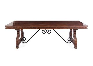 A Spanish Baroque Style Iron-Mounted Walnut and Elm Trestle Table