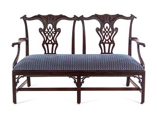 A George III Style Carved Mahogany Double Chair-Back Settee after a Design by Thomas Chippendale