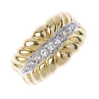 An 18ct gold paste ring. Designed as a series of graduated paste line, within a grooved surround, to
